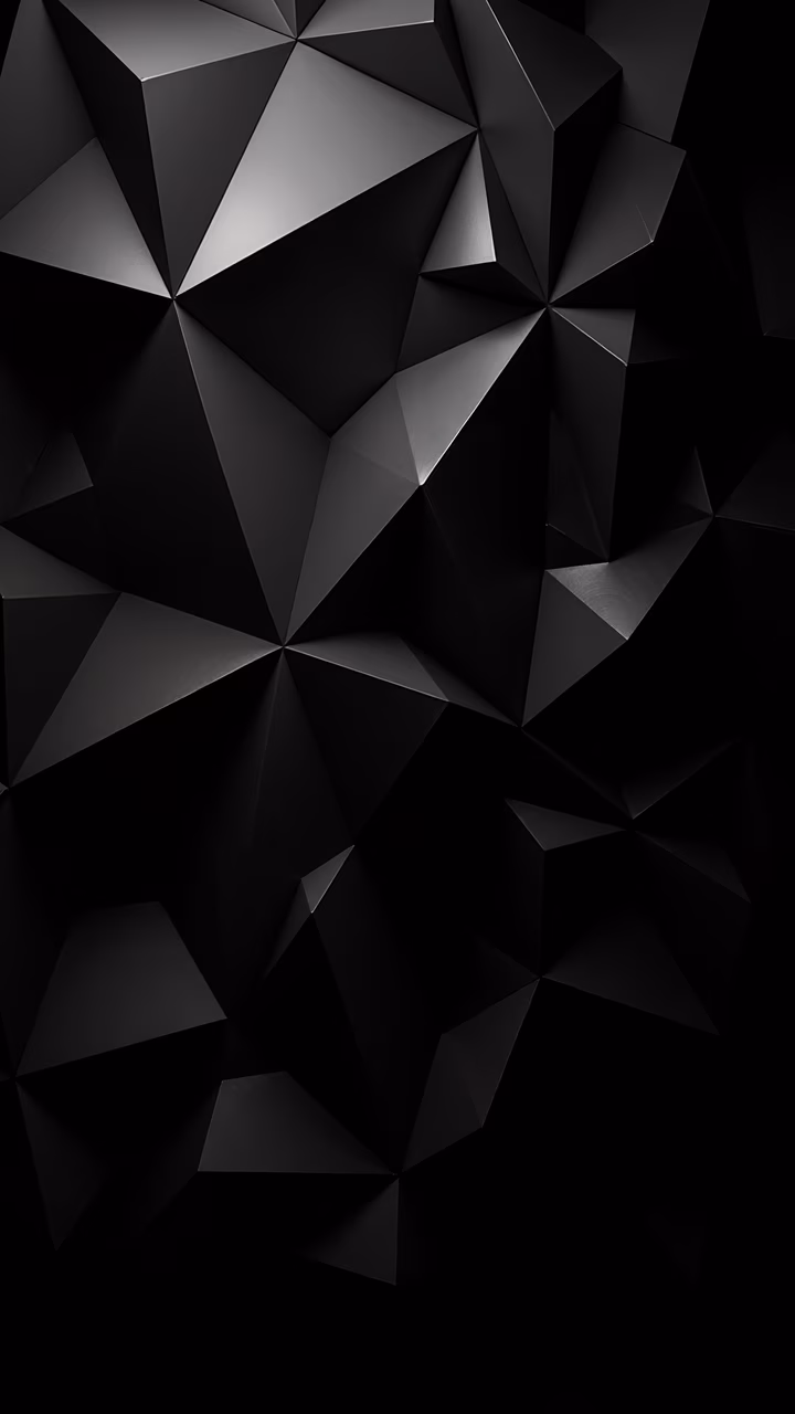 Abstract geometric triangles in shades of black and gray, creating a sophisticated and minimalist design.