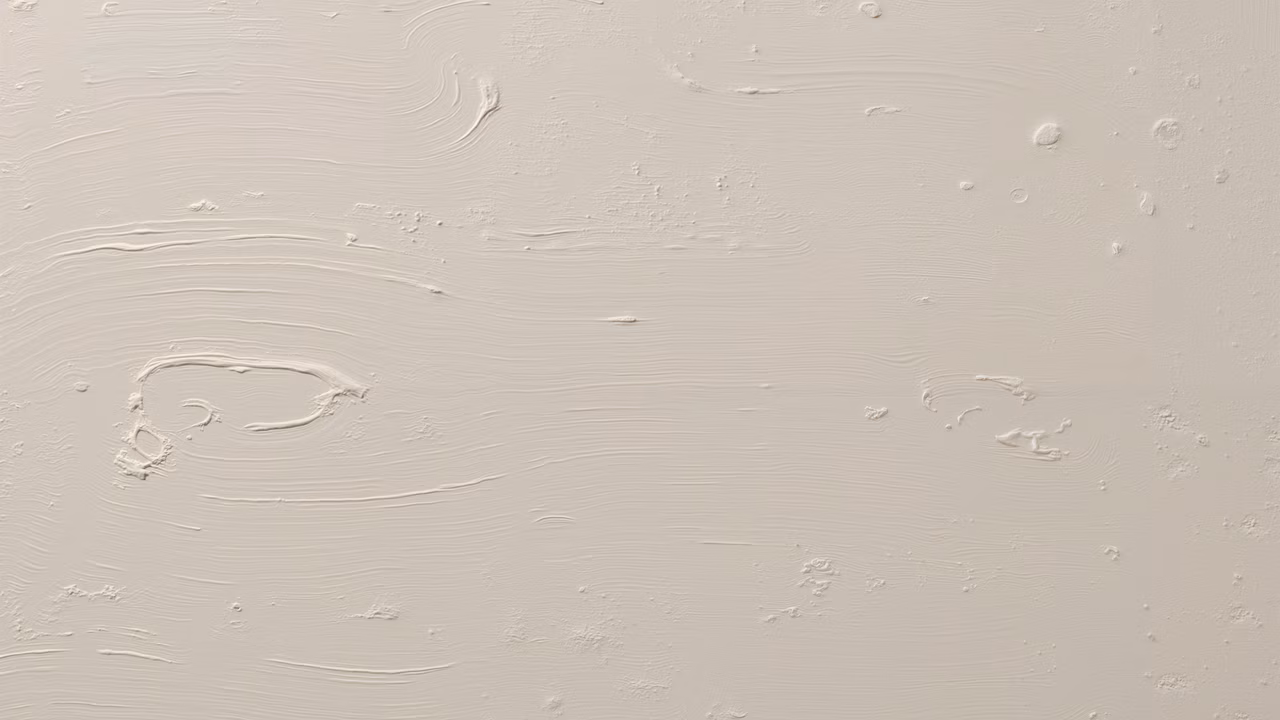 Abstract painting texture with neutral tones and intricate brushstrokes.