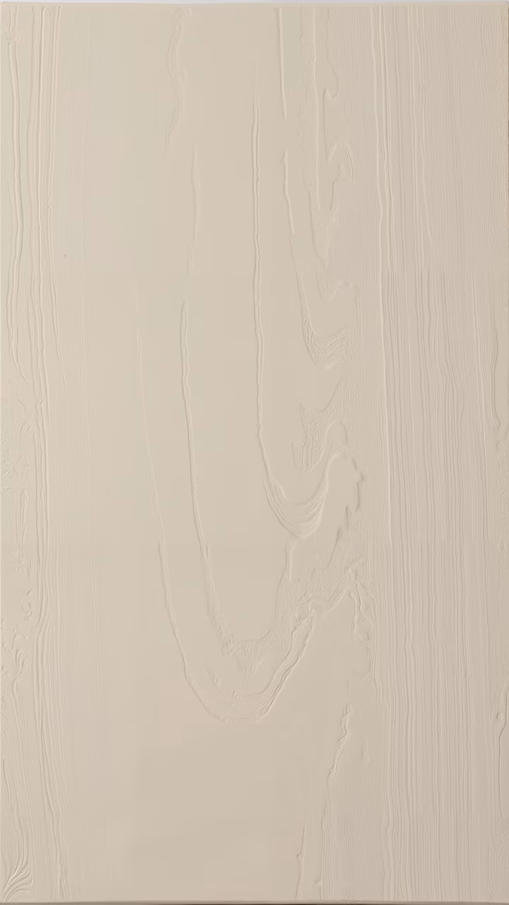 Minimalist abstract relief sculpture with flowing form and interplay of light and shadow.