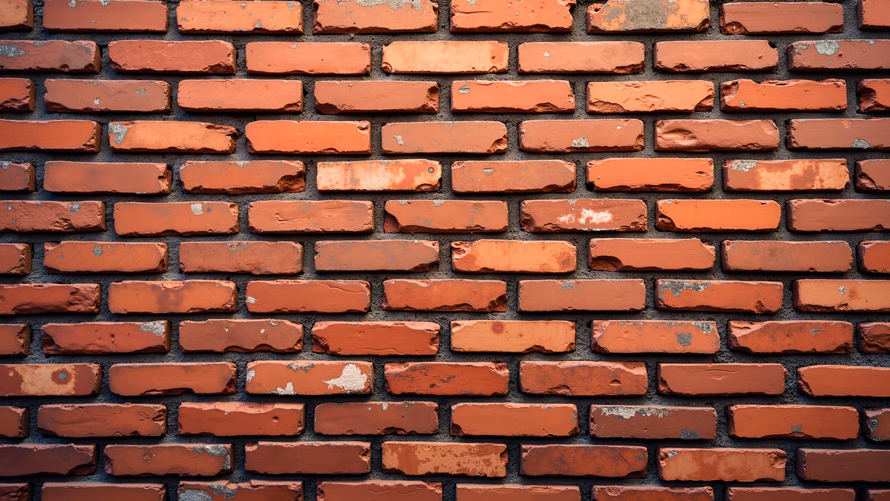 A detailed illustration of a brick wall with red bricks arranged in a traditional pattern, emphasizing texture and color variations.