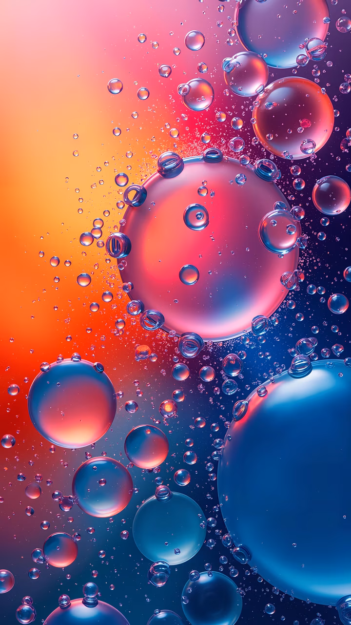 Mesmerizing array of glossy bubbles in vibrant hues, abstract art featuring smooth color transitions.