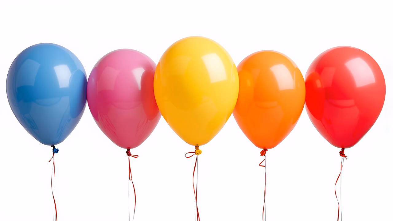 Vibrant balloons in a row, celebrating joy and festivity.