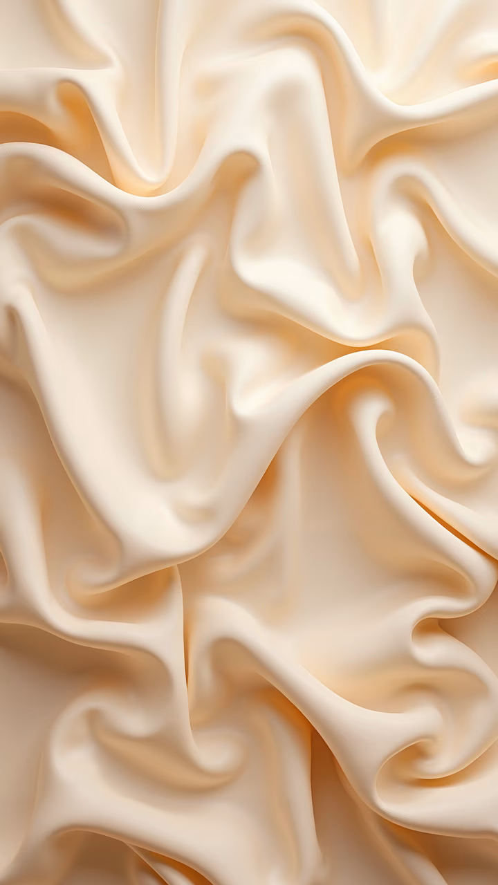 Smooth, creamy swirls in soft beige tones create an elegant and luxurious abstract artwork.