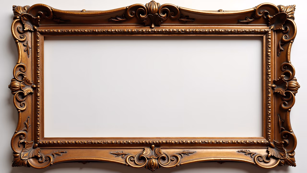 Luxurious golden ornate frame with intricate details for decorative purposes.