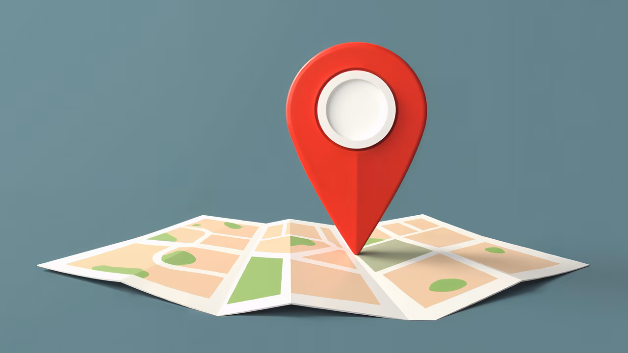 A red map pin on an open map, symbolizing navigation and location.
