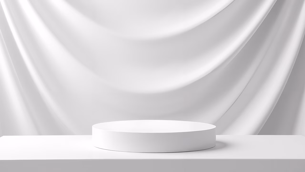 Minimalist podium with soft lighting and flowing fabric, creating elegance and depth.