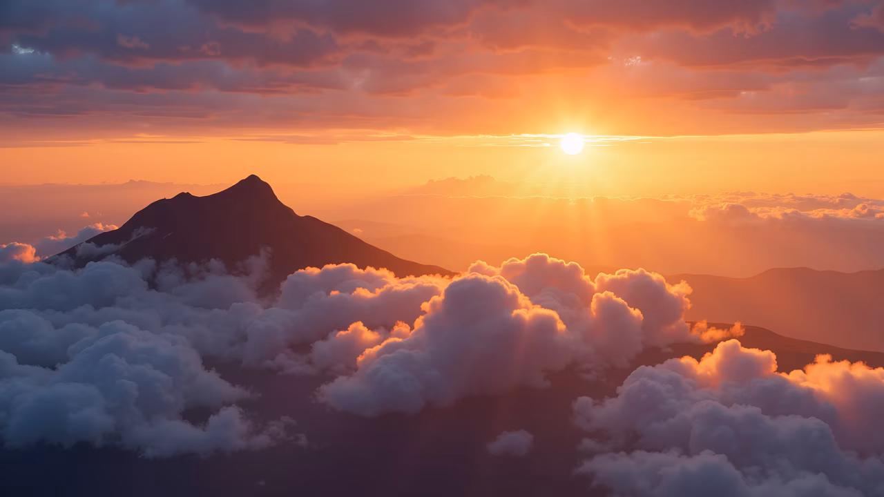 A stunning sunset over mountains, featuring warm colors and a serene atmosphere.