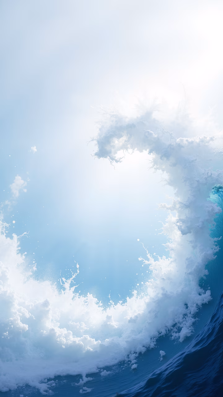 Dynamic ocean wave illustration with frothy white crest and deep blue water against a light blue sky.
