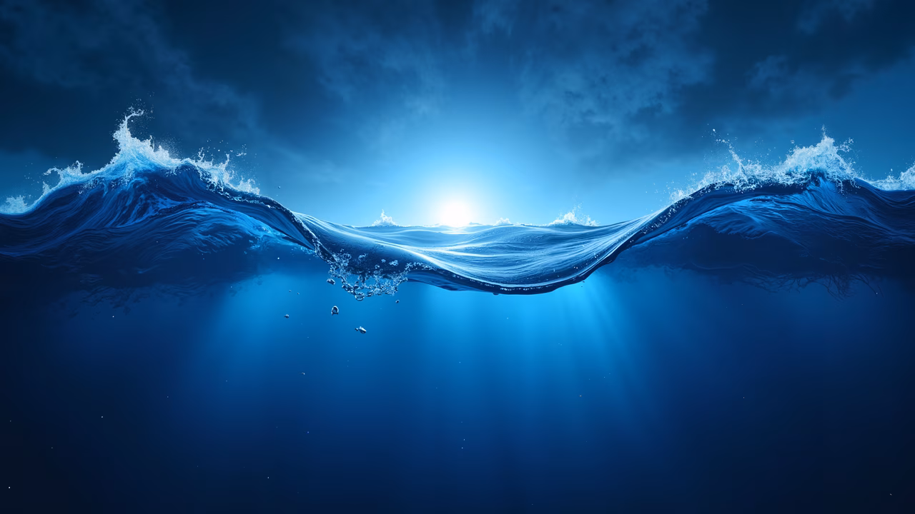 Dynamic ocean waves under a bright sun, deep blue tones, serene yet powerful atmosphere.