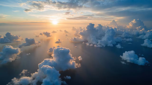 Sunset Over the Clouds