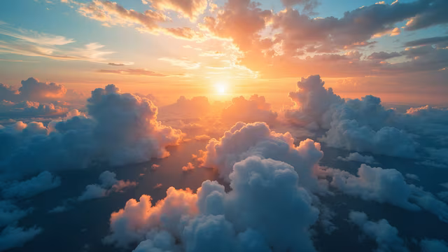 Sunset Over the Clouds