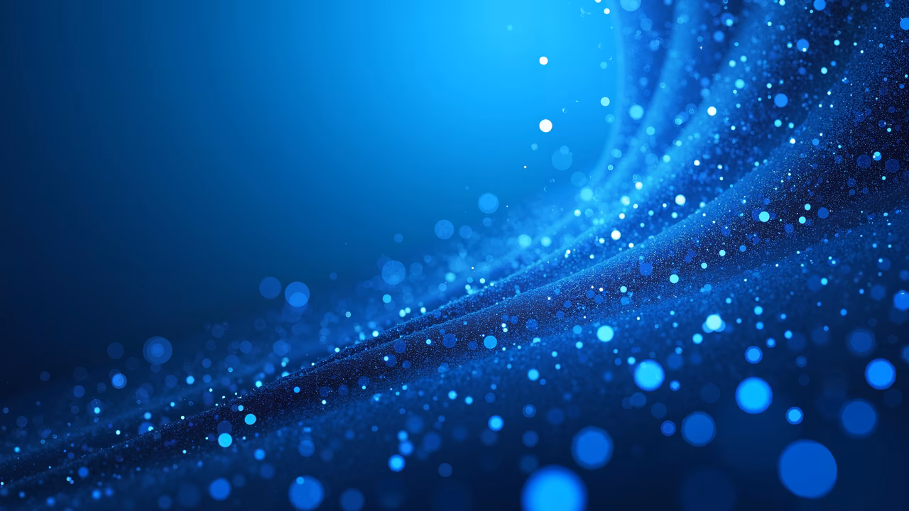 Mesmerizing blue sparkling waves in an abstract art style, perfect for backgrounds or wallpapers.