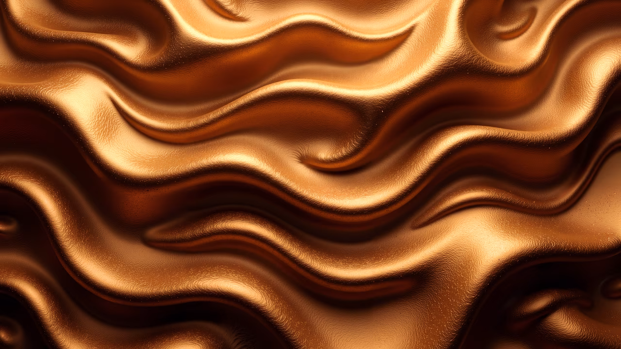 Glossy gold liquid waves with luxurious texture and dynamic movement.