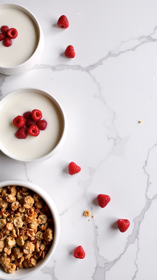 Yogurt Bowls with Granola and Raspberries