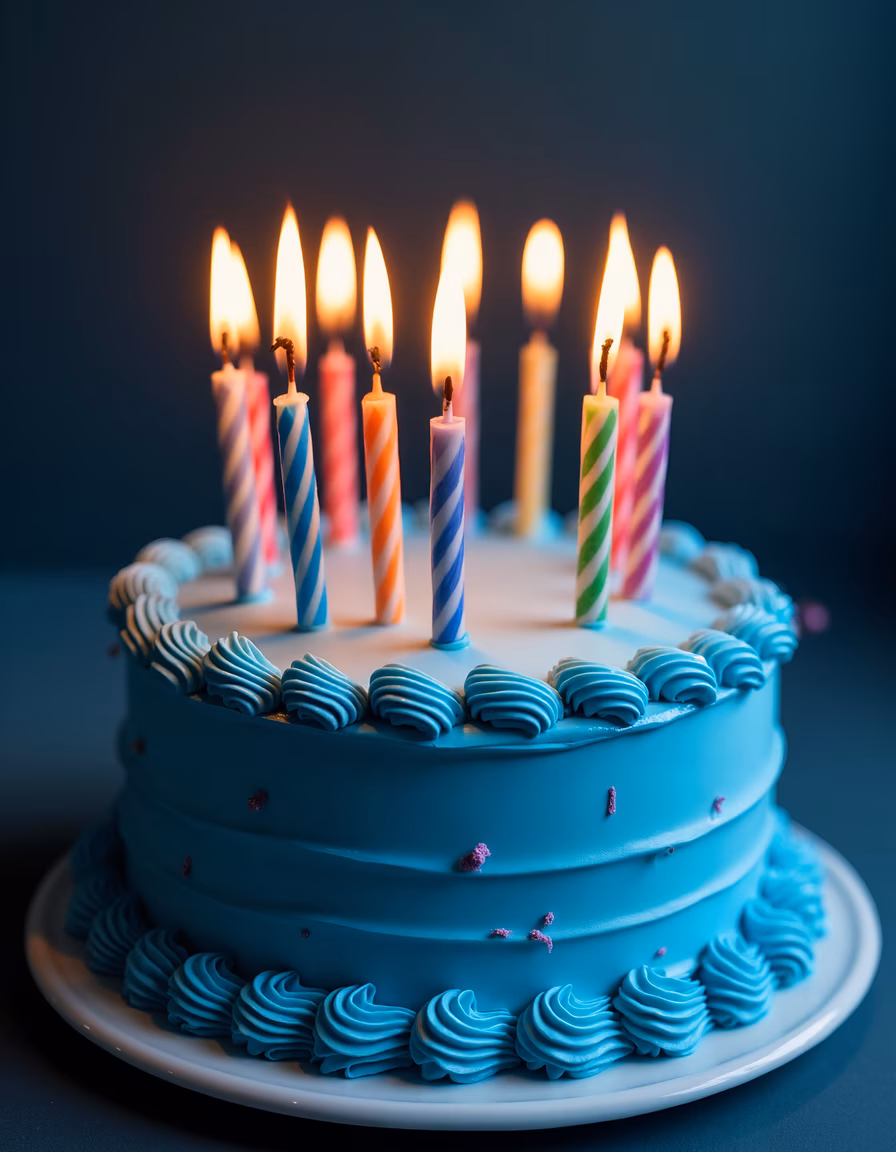 A beautifully decorated birthday cake with colorful candles, perfect for celebrations!
