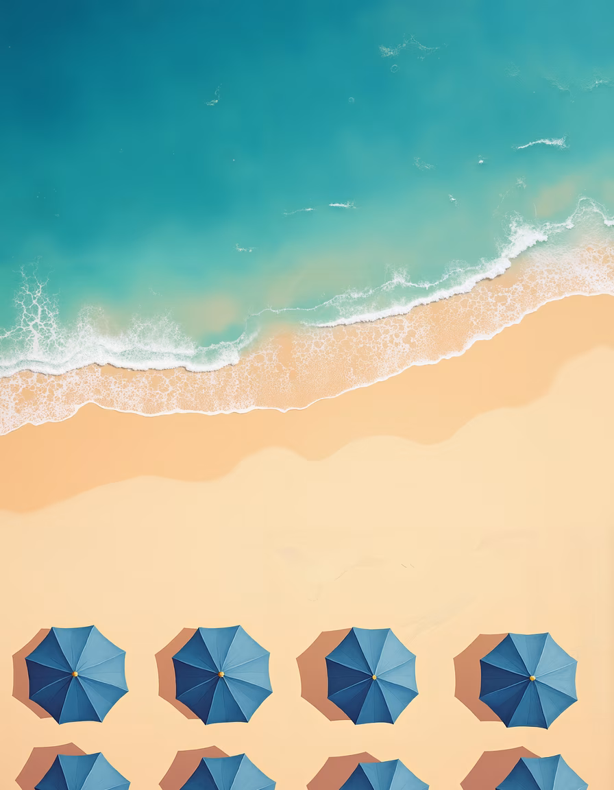 Aerial view of a beach with blue umbrellas and turquoise water.
