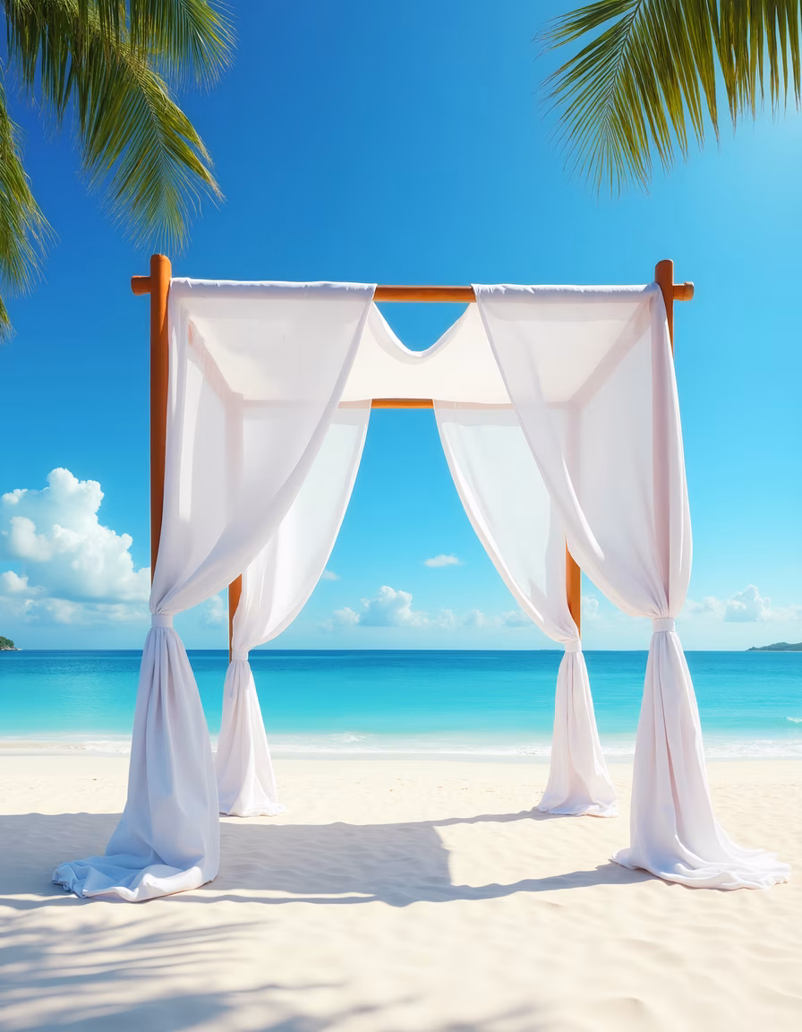 Romantic beach wedding arch on white sand under a clear blue sky.