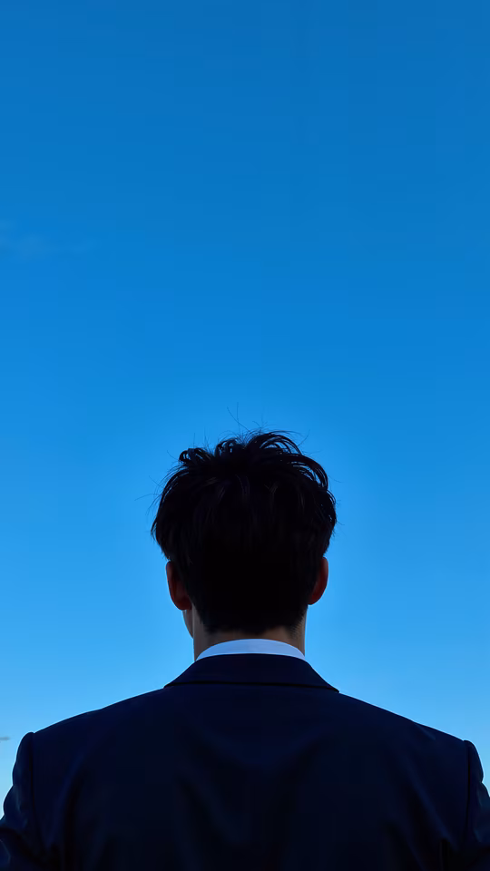 Man Looking Up at Sky