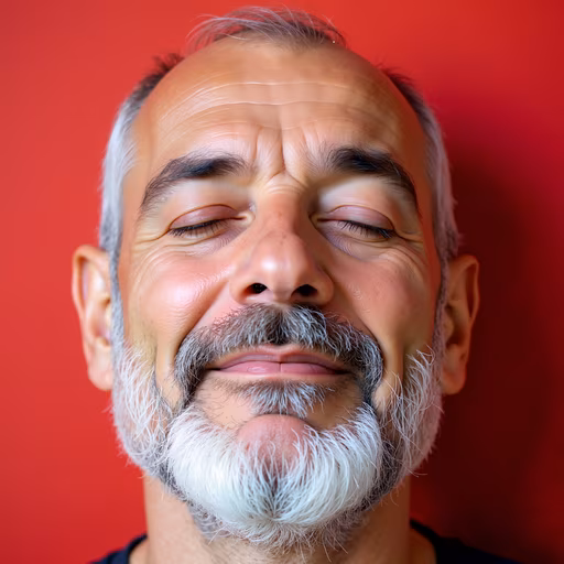 Man Smiling with Closed Eyes