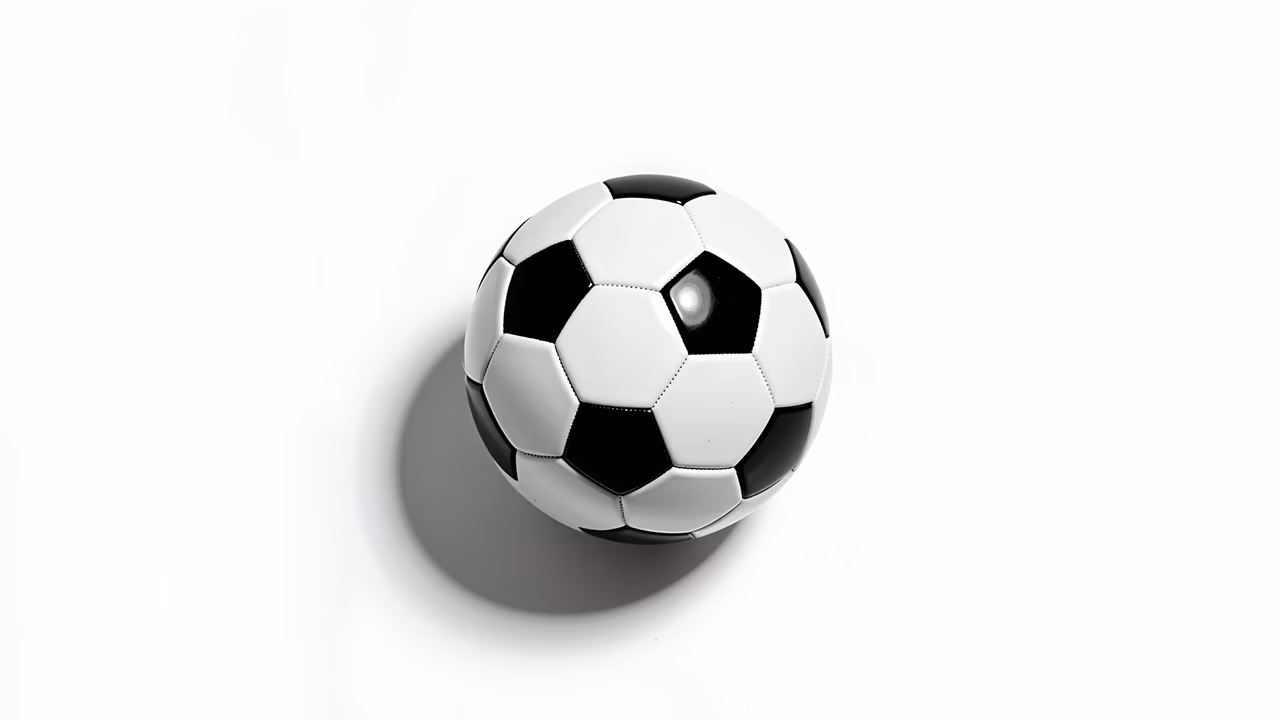 Classic black and white soccer ball on a white background