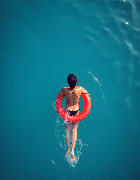 Woman Jumping into Water
