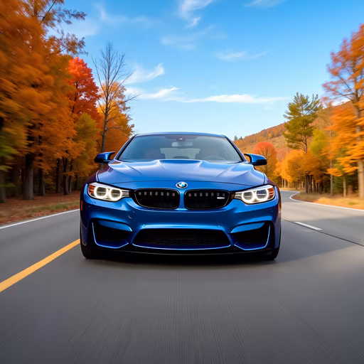 Blue BMW on Autumn Road
