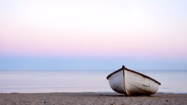 Lonely Boat at Sunset