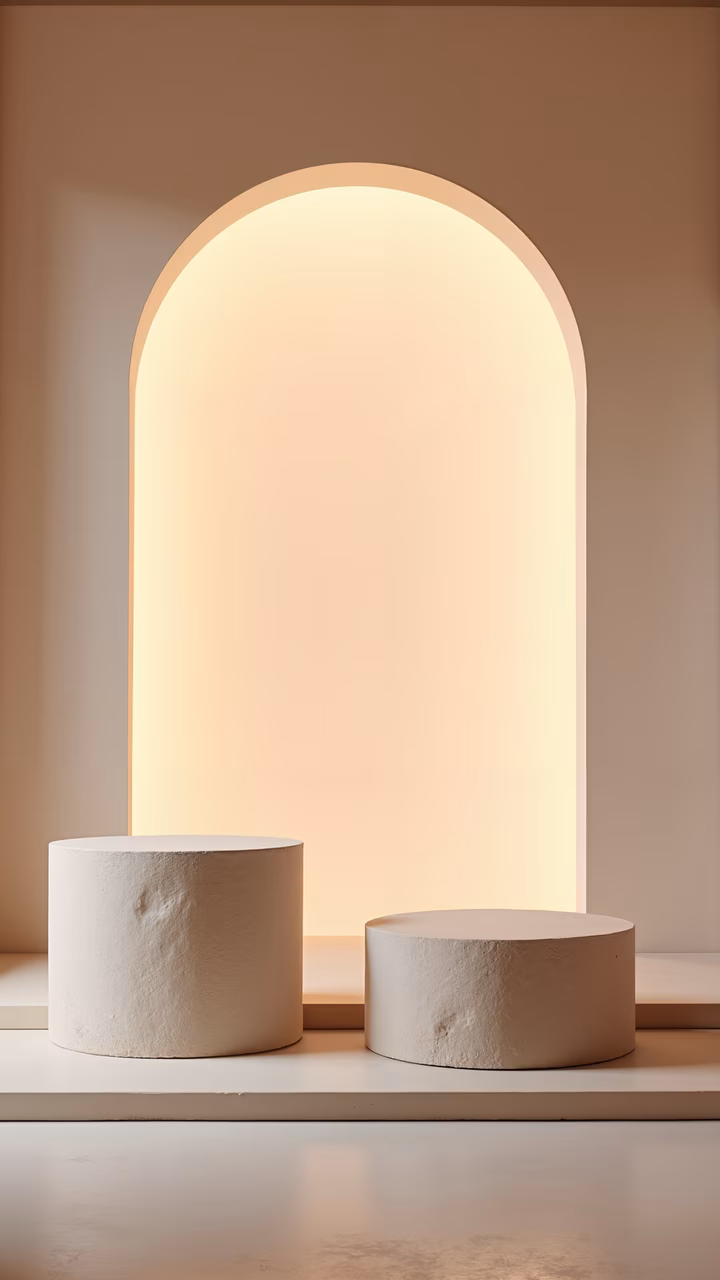 Symmetrical podiums in a minimalist interior with warm lighting.