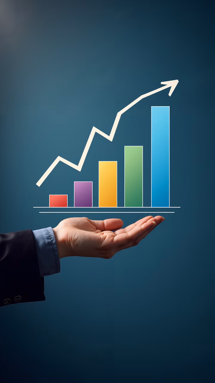 Hand presenting a colorful bar chart with an upward arrow, symbolizing growth.