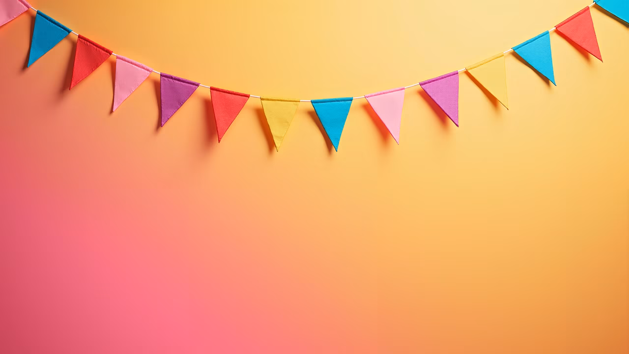 Brightly colored pennant garland on a gradient background.