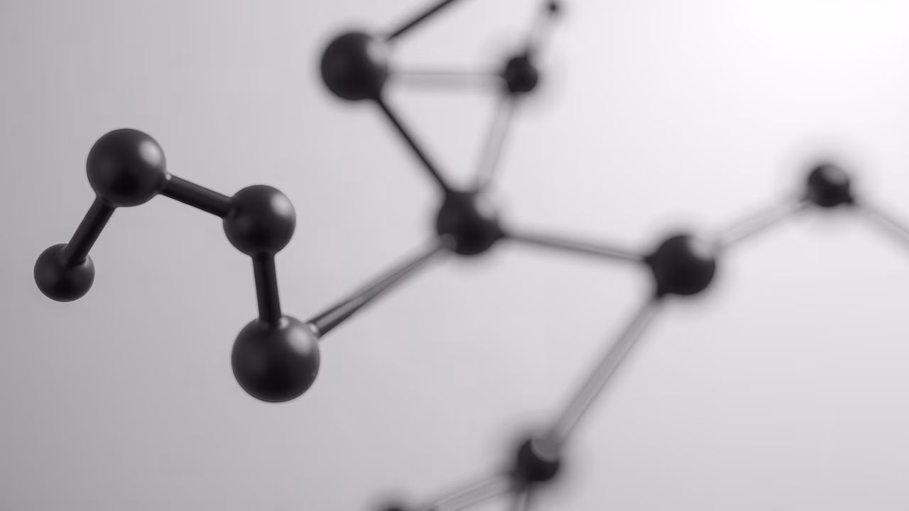 Monochrome molecular structure illustration highlighting scientific precision.