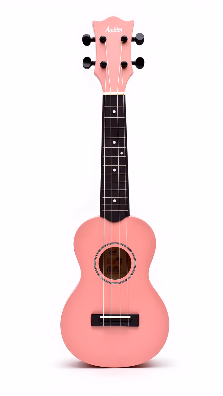 Vibrant pink ukulele with matte finish and black details on white background.