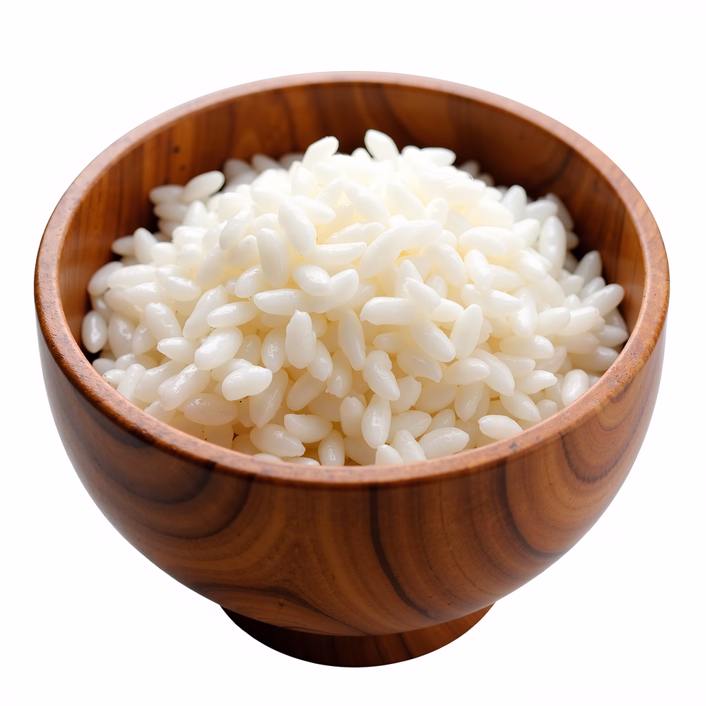 Close-up of rice in a wooden bowl, emphasizing texture and contrast.