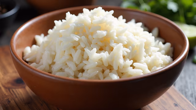 Steamed Rice in Clay Bowl