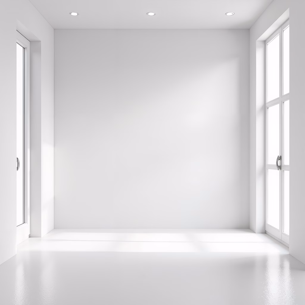 A pristine, minimalist white room illuminated by natural light.