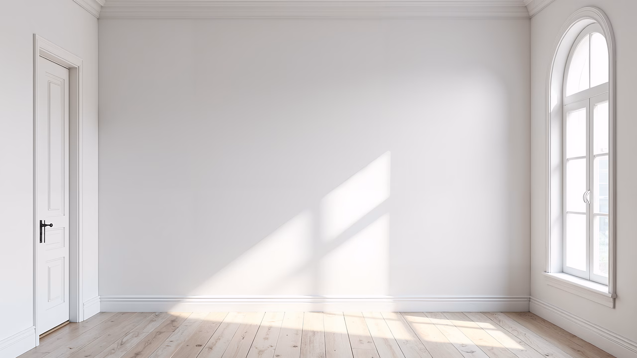 A peaceful minimalist interior with soft natural light and clean lines.