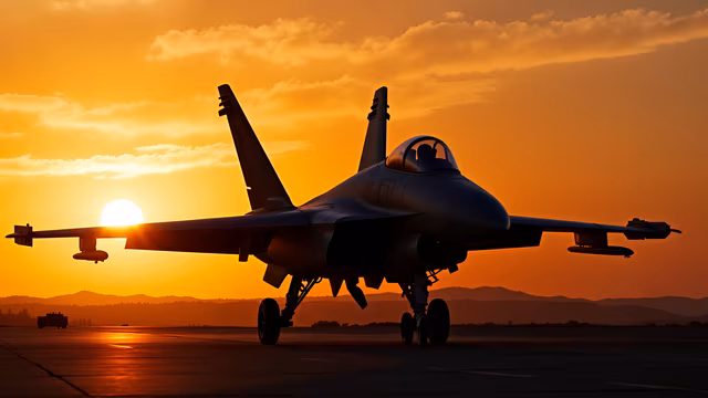 Silhouette Fighter Jet at Sunset