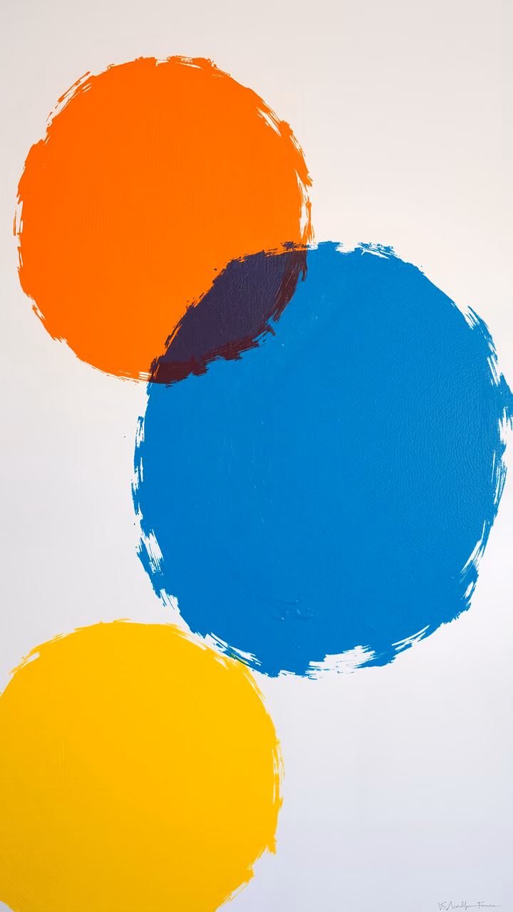 Vibrant abstract circles on a minimalist background.