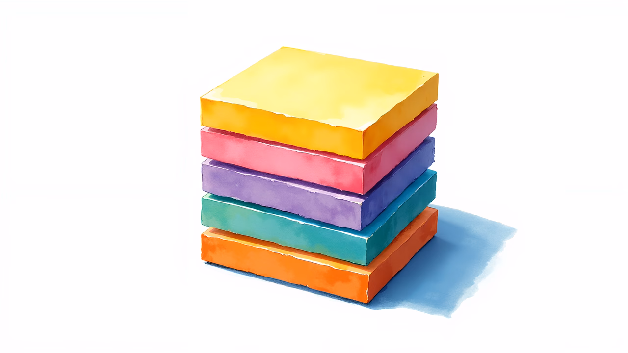 A stack of colorful blocks on a white background, showcasing vibrant hues and a minimalist aesthetic.