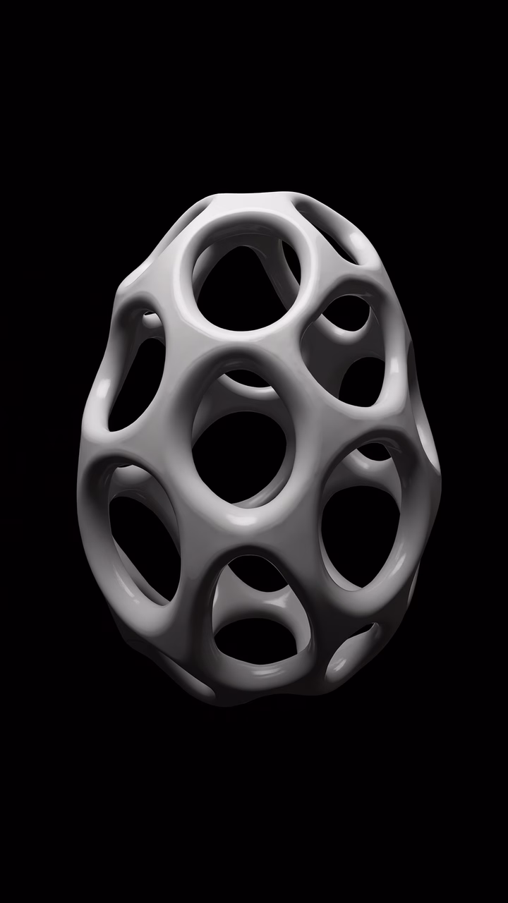 Abstract sphere with holes on a black background, showcasing modern art.