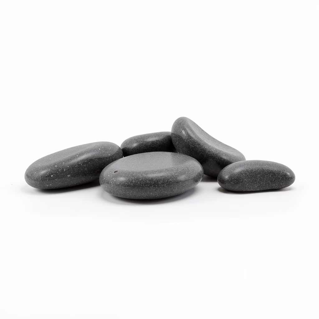 Smooth pebbles against a white background, minimalist nature photography.