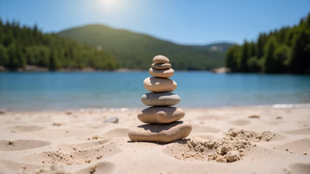 Balanced Stones by the Lake