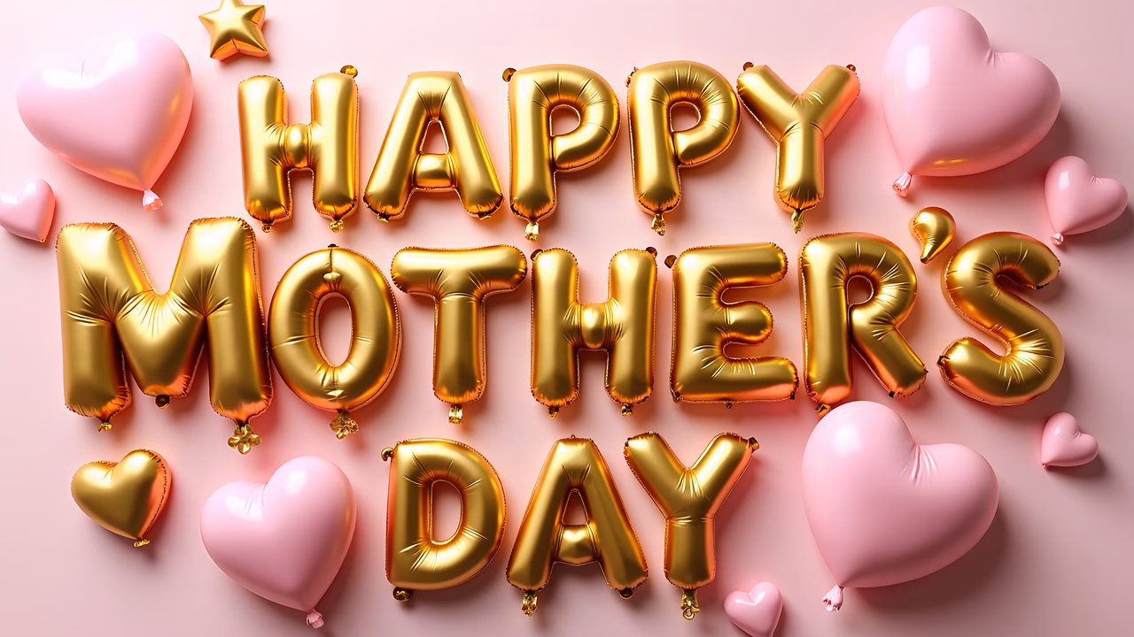 Golden balloons spell out 'Happy Mother's Day' on a pink background, celebrating the holiday with joy and warmth.