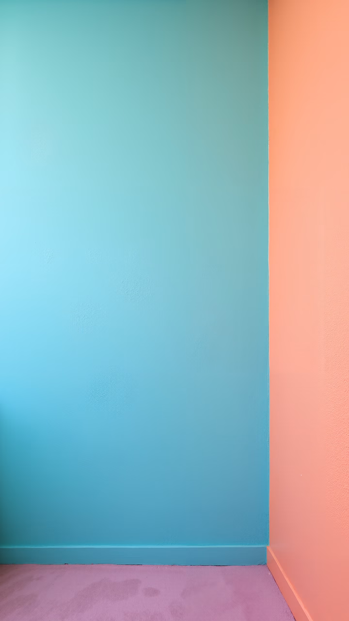 Contrasting teal and coral walls with a soft lavender floor in a minimalist setting.