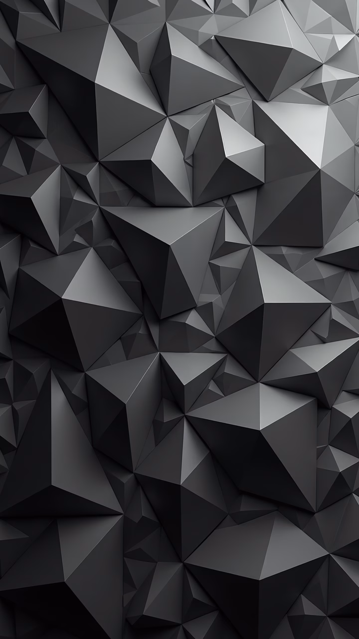 Abstract geometric triangles in shades of gray, creating a sense of depth and movement.
