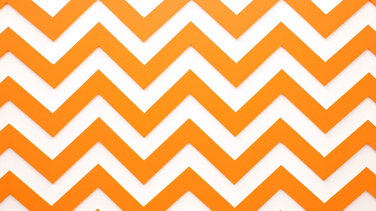 Bold orange chevron pattern on white background