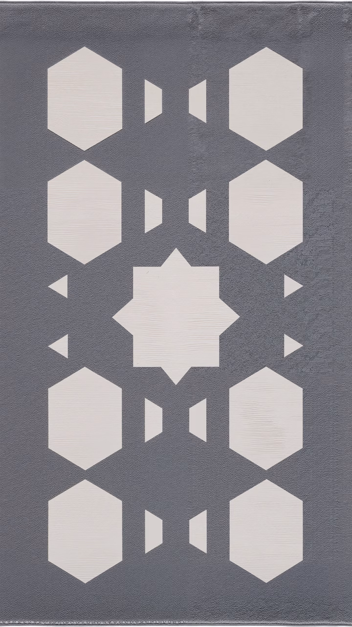 Symmetrical geometric shapes on a textured gray background, modernist abstraction.