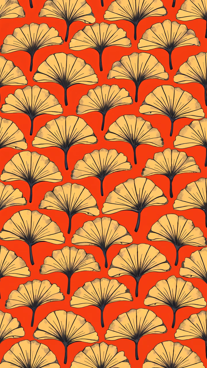 Vibrant ginkgo leaf pattern on red background