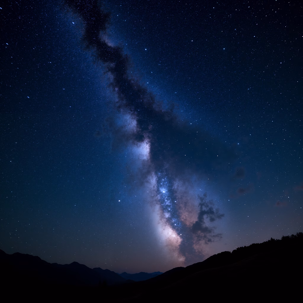 Stunning Milky Way over mountainous landscape under a starlit sky.