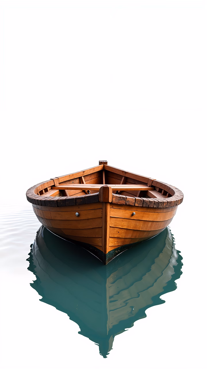 A wooden boat with perfect reflection in calm waters.